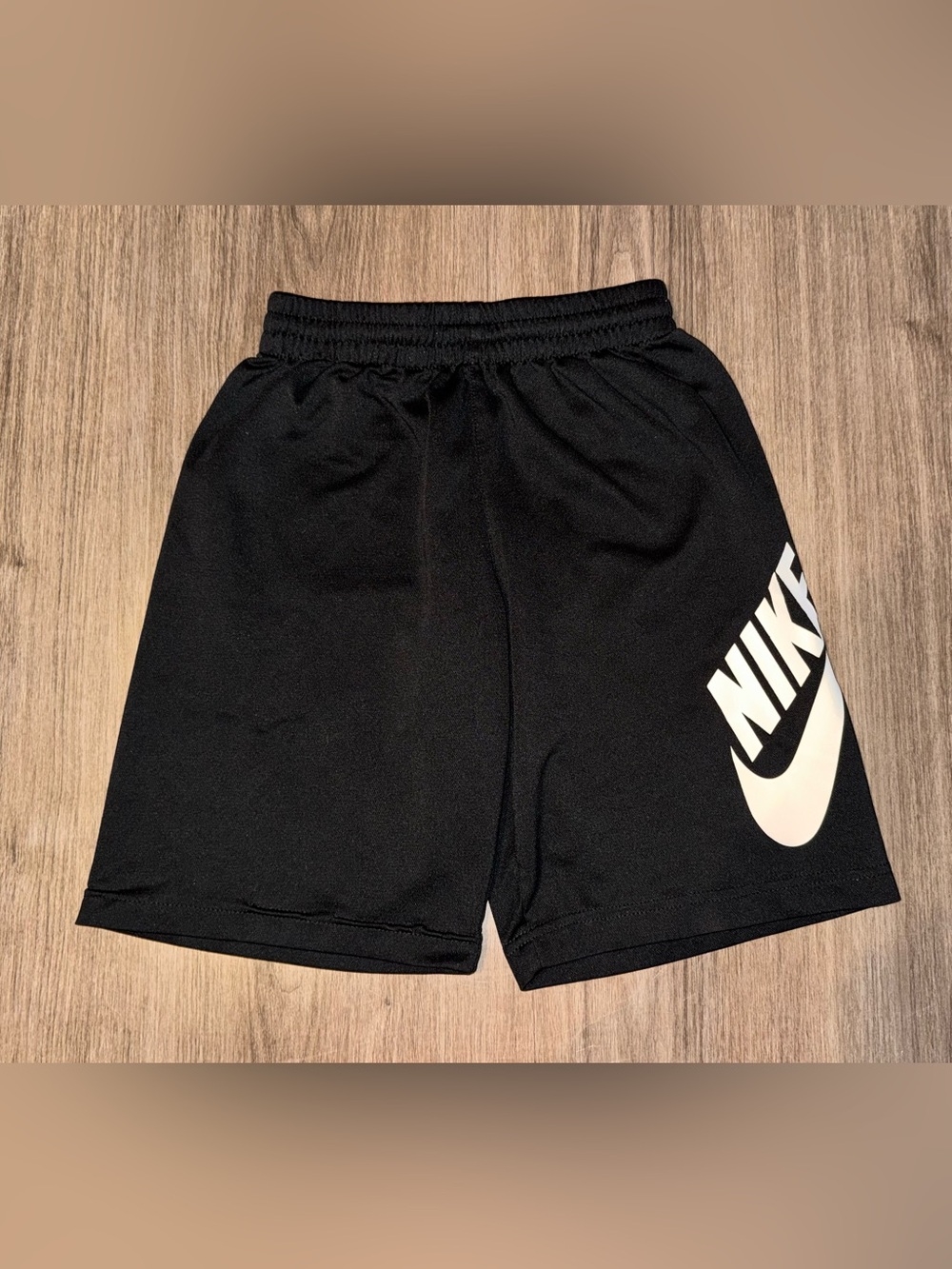 Nike Black Athletic Shorts with White Swoosh, size YS